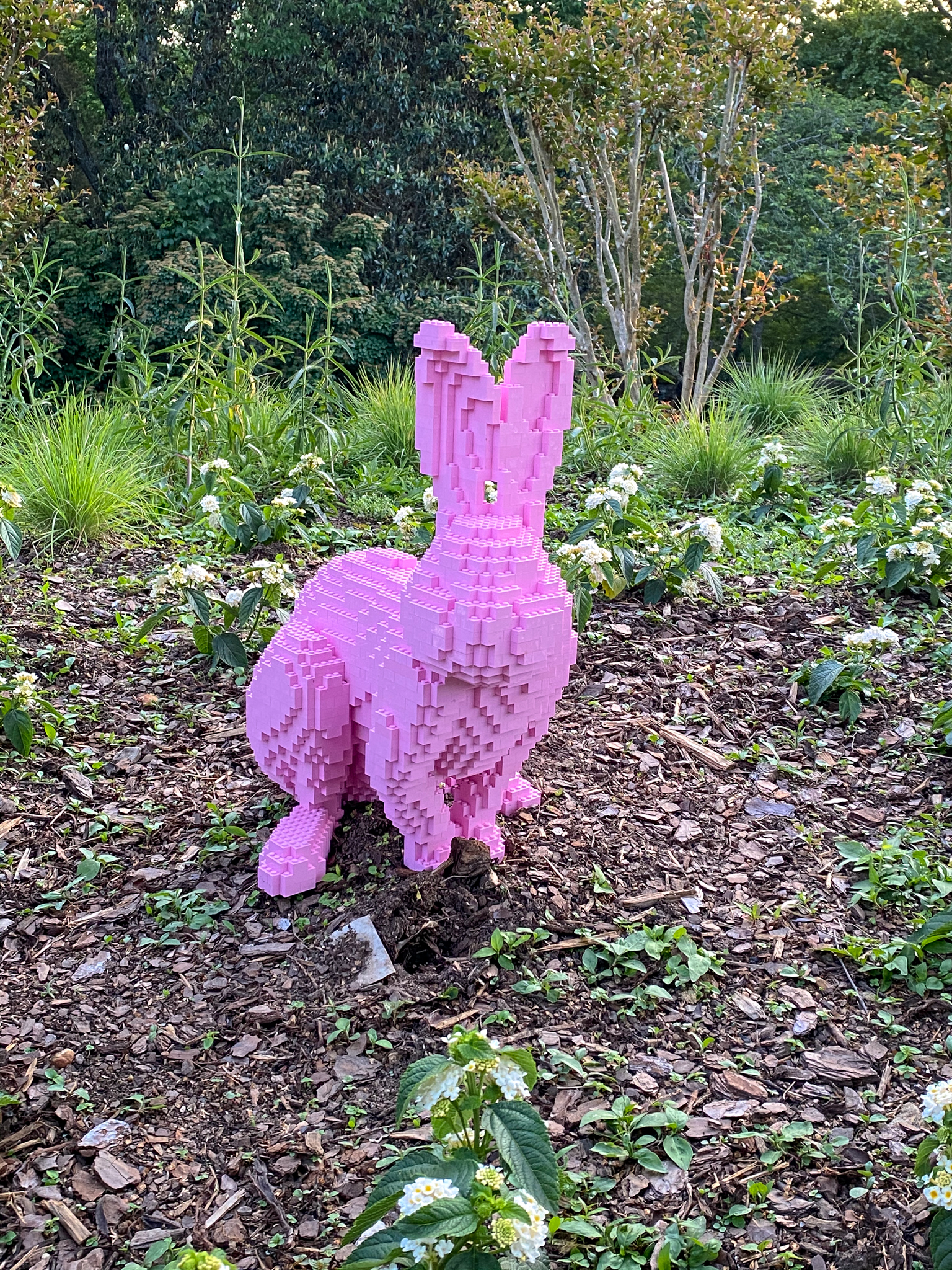 Crouching pink Lego rabbit